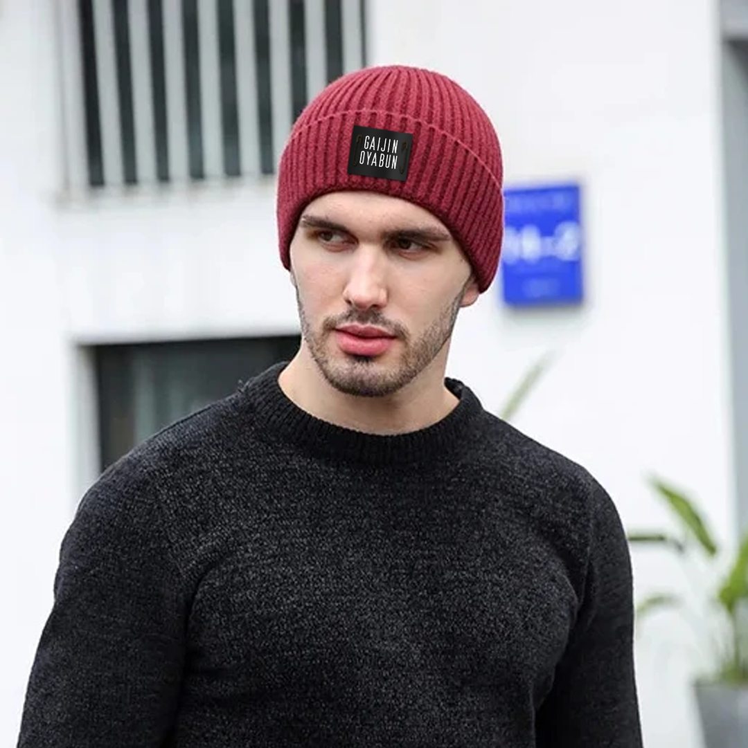 "Trendy wine red beanie hat. Perfect for cold weather fashion."
